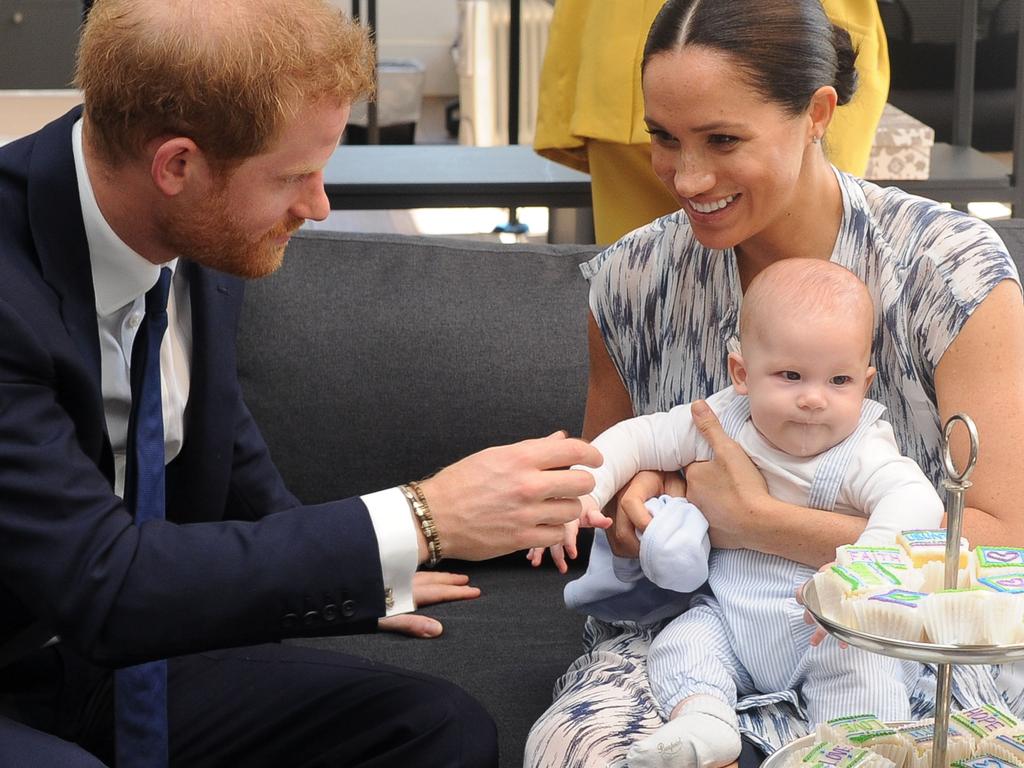 The Duke and Duchess of Sussex, with baby son Archie during their trip to South Africa. Henk Kruger