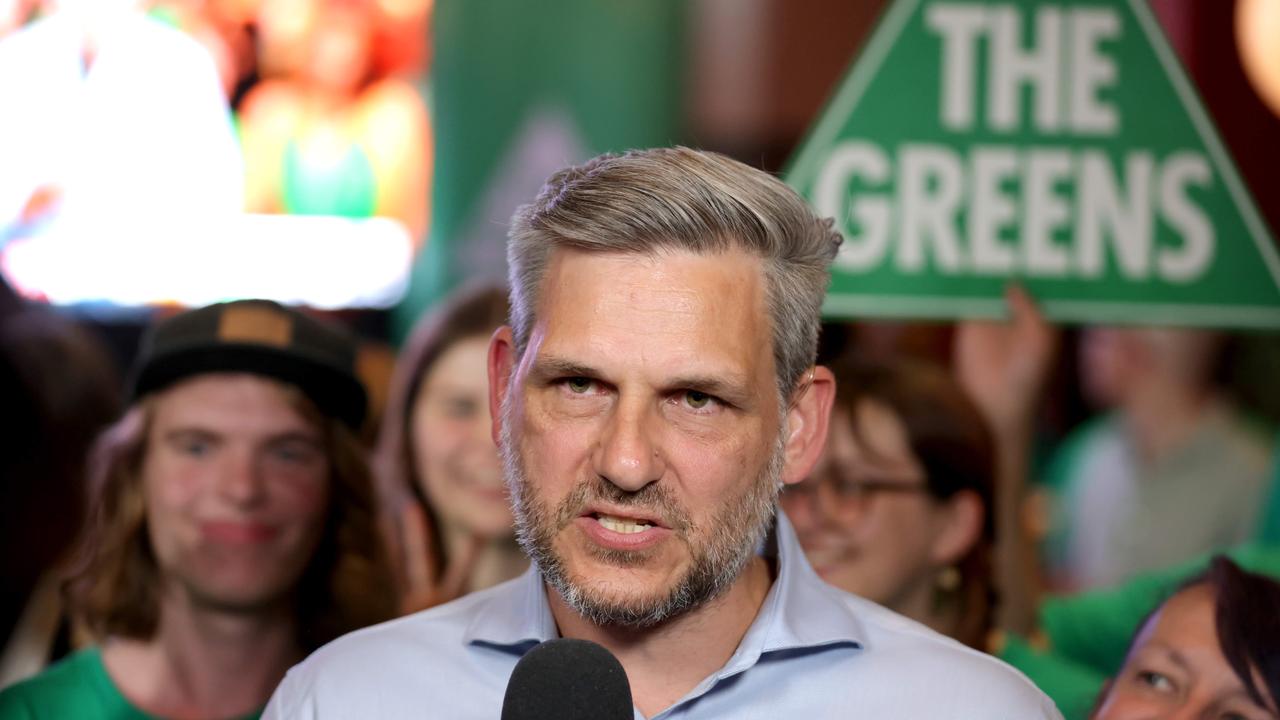 Michael Berkman addresses the faithful at the Greens party on election night at the Story Bridge Hotel. Picture: Steve Pohlner