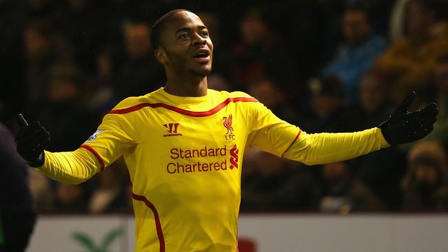 BURNLEY, ENGLAND - DECEMBER 26: Raheem Sterling of Liverpool celebrates scoring the opening goal during the Barclays Premier League match between Burnley and Liverpool at Turf Moor on December 26, 2014 in Burnley, England. (Photo by Bryn Lennon/Getty Images)