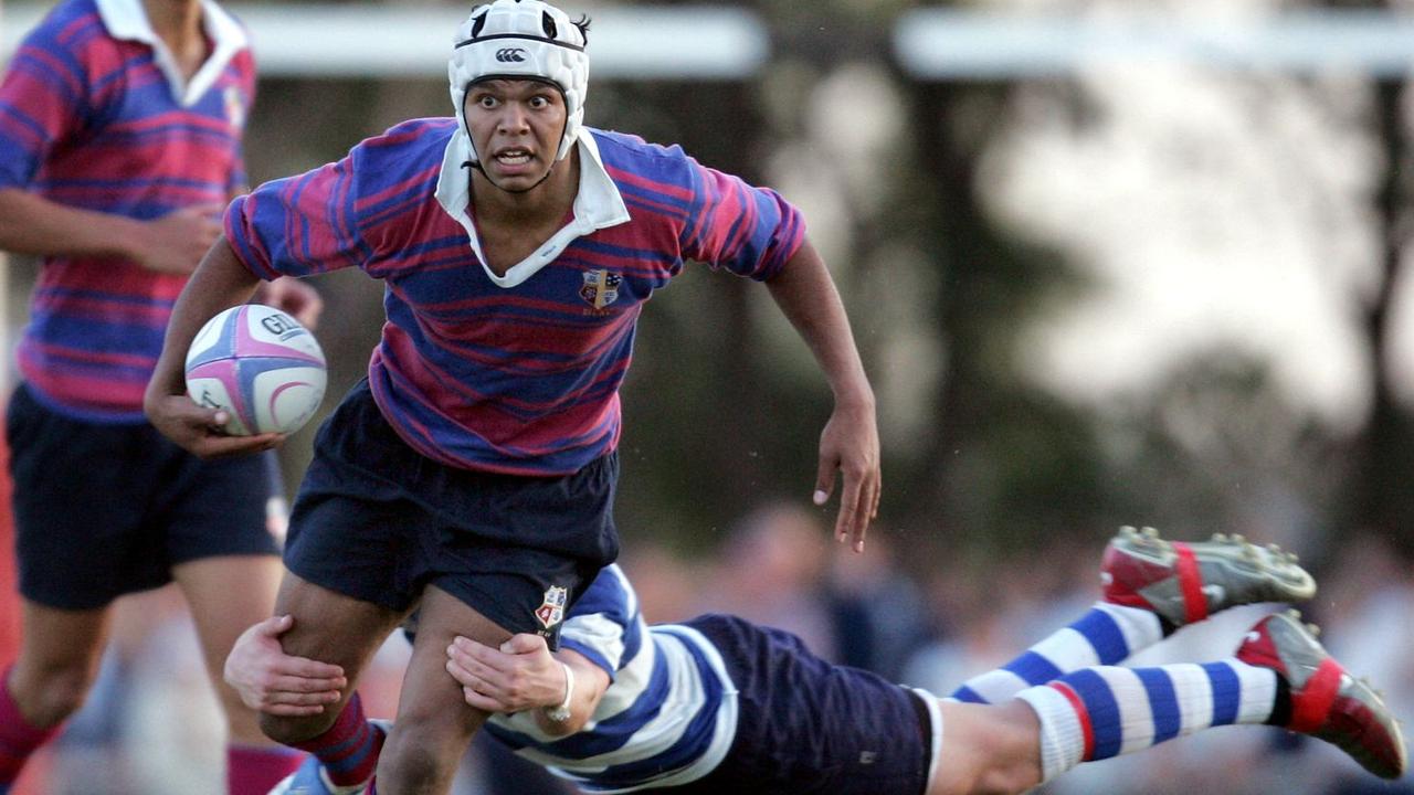 Joeys star Kurtley Beale tries to avoid the tackle of Alistair Clifton at Hunters Hill.