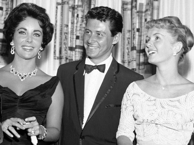 Elizabeth Taylor, Eddie Fisher and Debbie Reynolds, in Las Vegas in 1958. Fisher would go on to have an affair with — and marry — Taylor. Picture: AP