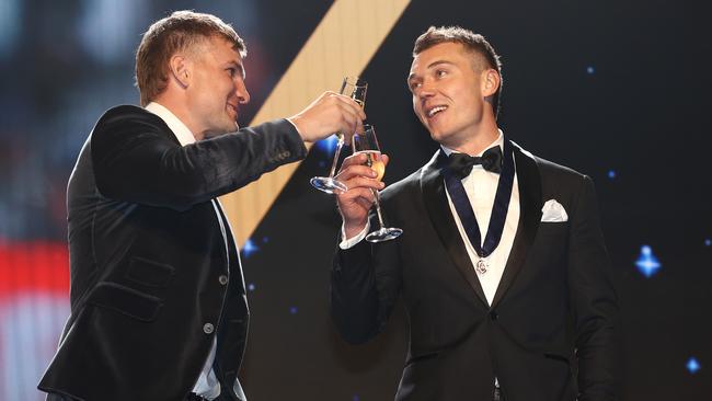 Last year’s Brownlow medalist Ollie Wines toasts Patrick Cripps. Picture: Michael Klein