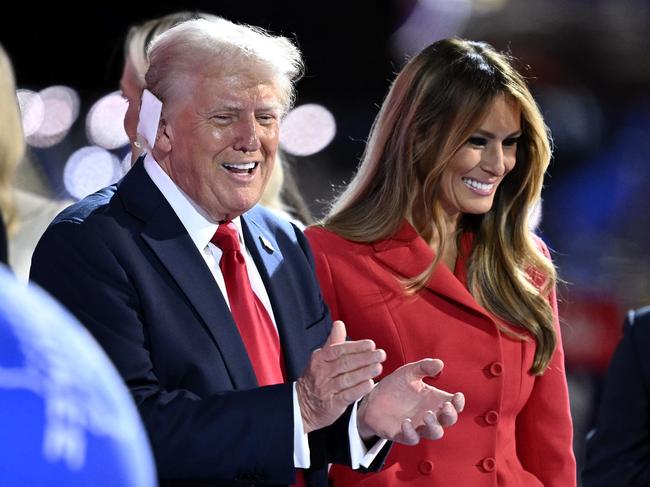 Former US President and 2024 Republican presidential candidate Donald Trump is joined by Former US First Lady Melania Trump after accepting his party's nomination on the last day of the 2024 Republican National Convention at the Fiserv Forum in Milwaukee, Wisconsin, on July 18, 2024. Days after he survived an assassination attempt Trump won formal nomination as the Republican presidential candidate and picked Ohio US Senator J.D. Vance for running mate. (Photo by ANGELA WEISS / AFP)