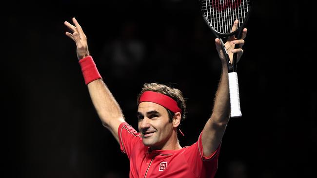 Roger Federer celebrates beating Australian Alex de Minaur. Picture: Fabrice Coffrini/AFP