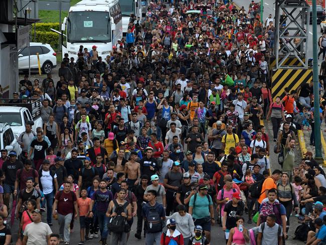 Latin American migrants take part in a caravan towards the border with the United States, in Huehuetan, Chiapas state, Mexico, on June 7, 2022. Picture: AFP