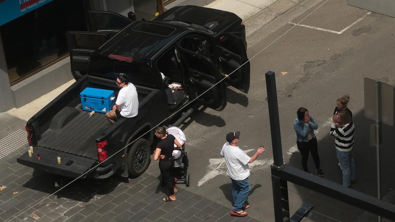 Music played loudly from a black ute parked at the scene as loved ones gathered to pay tribute.