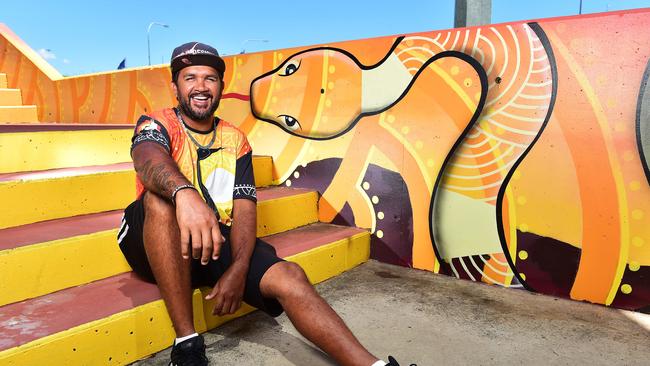 Artist Nicky Bidju Pryor, Bidju Designs, in front of his latest collaboration at Riverway Skate Park. Picture: Shae Beplate.