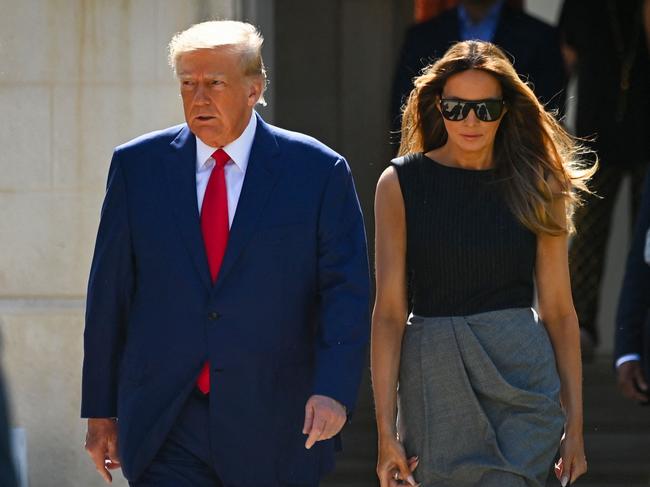 Donald Trump and his wife, Melania, leave a polling station after voting in the US midterm elections in Palm Beach, Florida. Picture: Eva Marie Uzcategui / AFP)