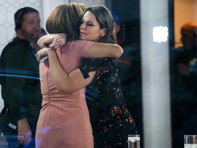 Today host Savannah Guthrie embraces colleague Hoda Kotb after news of Matt Lauer’s axing became public. Picture: AP Photo/Craig Ruttle