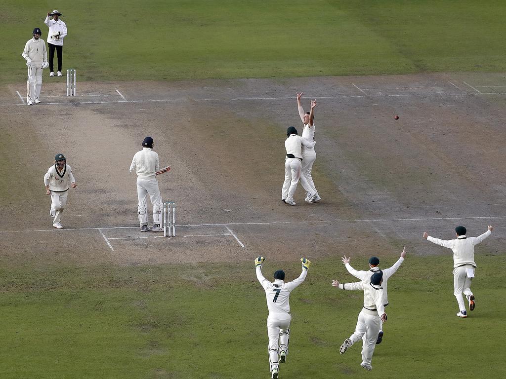 The moment the Aussies claimed victory at Old Trafford after Josh Hazlewood dismissed Stuart Broad late on day five.