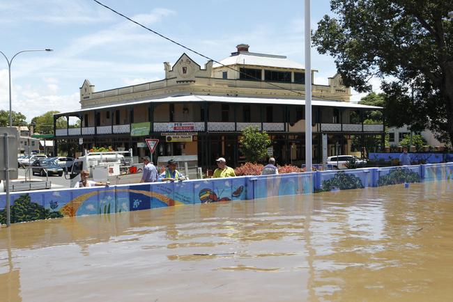 Aerial photos of Northern NSW Flooding. Grafton locals watch the floodwaters from behind the safety of the Levy which saved the town from flooding. Pic Glenn Hampson. Picture: HAMPSON GLENN