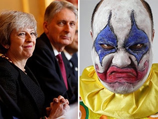 Theresa may, Philip Hammond and another clown.