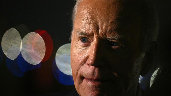 US President Joe Biden speaks with the media before boarding Air Force One at Chicago O'Hare International Airport after his DNC speech. (Photo by Brendan SMIALOWSKI / AFP)