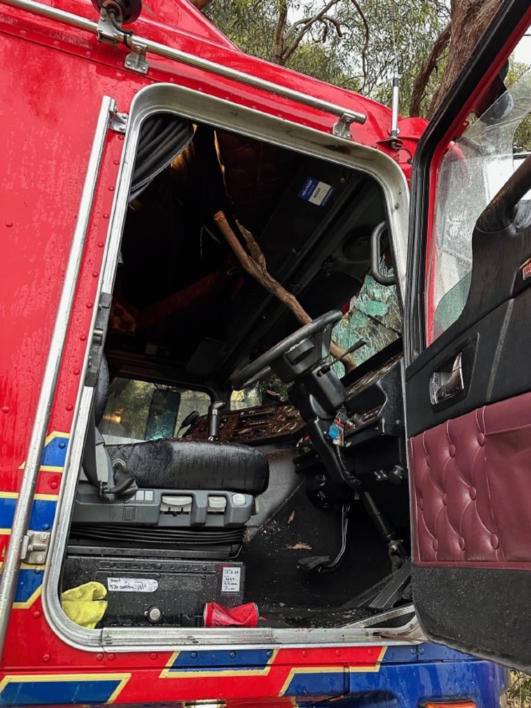 A truck driver is lucky to be alive after crashing into a tree, with a tree branch impaling the driver’s side of the windscreen. Picture: SAPOL