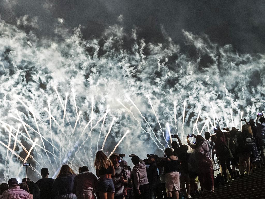 Crowds in Sydney braved the weather and they weren’t let down by the stunning fireworks. Picture: Getty Images