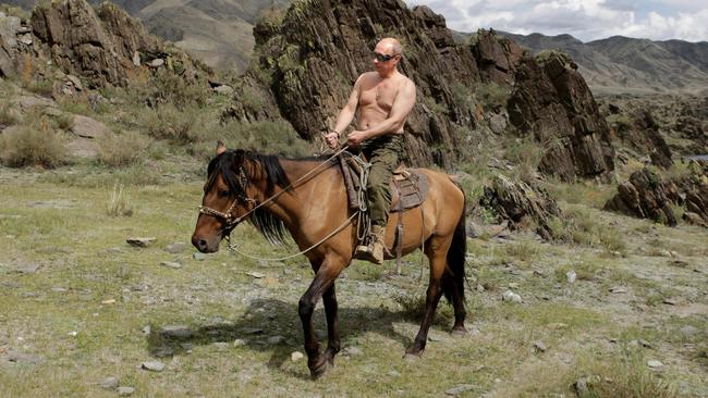 Russian Prime Minister Vladimir Putin rides a horse during his vacation outside the town of Kyzyl in Southern Siberia in 2009.