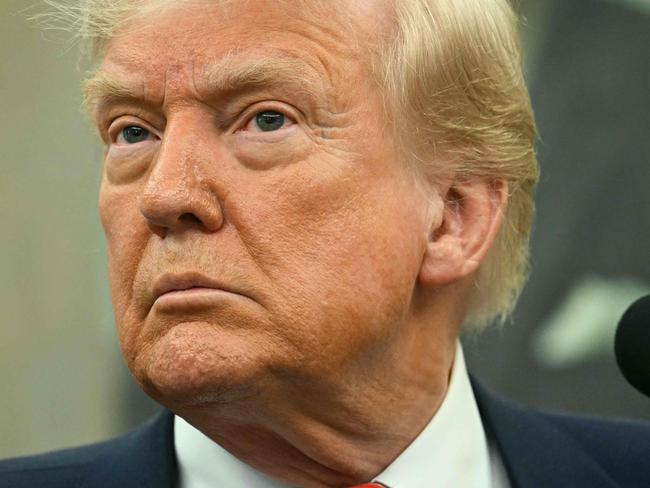 US President Donald Trump speaks during a swearing-in ceremony for the Ambassador to China, former Republican Senator of Georgia, David Perdue at the White House in Washington, DC, May 7, 2025. (Photo by Jim WATSON / AFP)