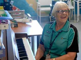 Julie Blair volunteers to play piano at the Base Hospital's rehab unit. Picture: Jann Houley