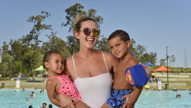 Sammy Boynton with children Milaya, 2 and Elijah, 3 beat the heat at Orion Lagoon.