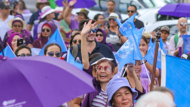 Crowds mass during Darwin's International Womens Day March in the CBD. Picture Glenn Campbell