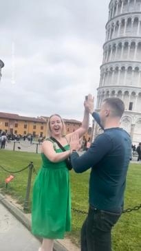 Mischievous pranksters high five tourists