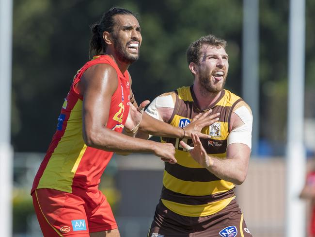 Gold Coast Suns ruckman Tom Nicholls (left) made his comeback from a shoulder injury in the club’s final NEAFL game of the year against Sydney. Pictured here going up against Aspley’s Jake Spencer. Picture: TJ Yelds/NEAFL.