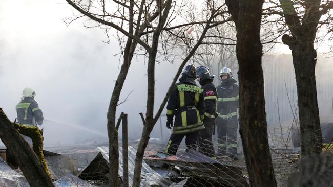 Rescuers work at the site of a drone attack in the village of Stanovoye, Moscow region, on November 10. Picture: AFP