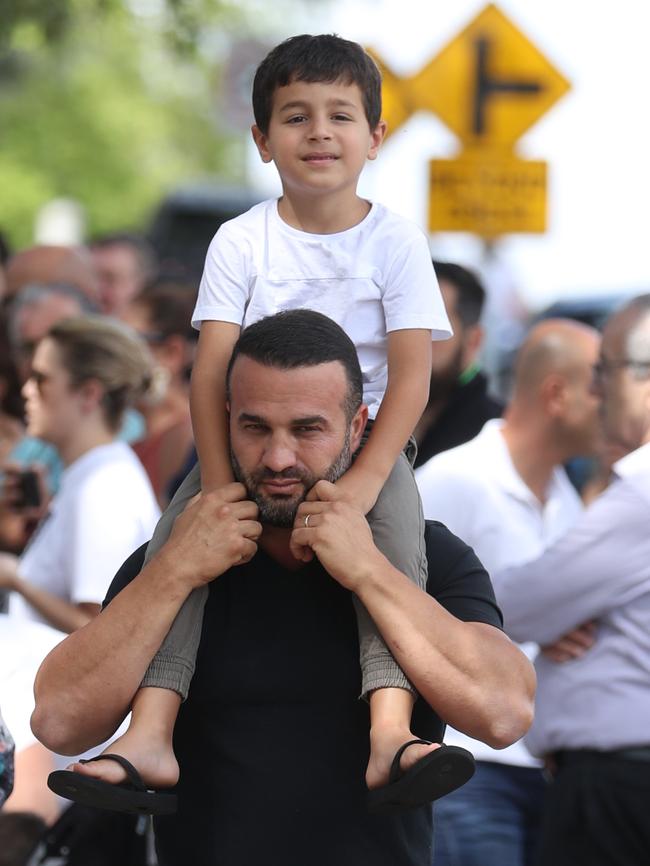 Danny Abdallah with a young son on Wednesday. Picture: John Grainger