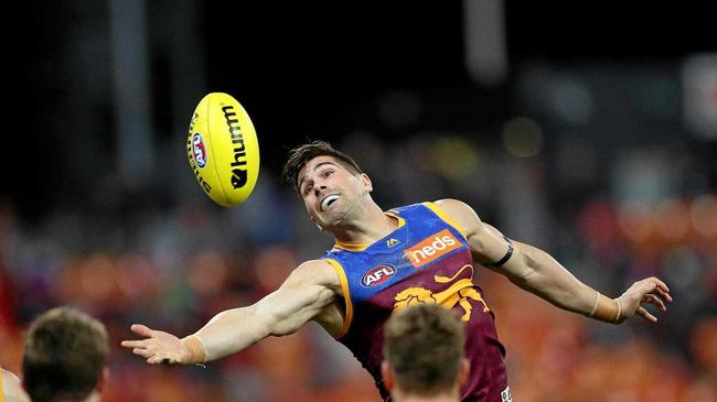 LINING UP: Brisbane's Marcus Adams in action against the Giants. Picture: Philip Hillyard