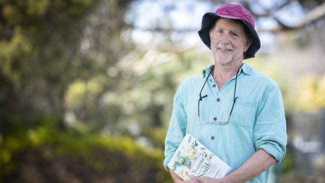 Author Simon Grove with his book titled Seasons in the South. Picture: Chris Kidd
