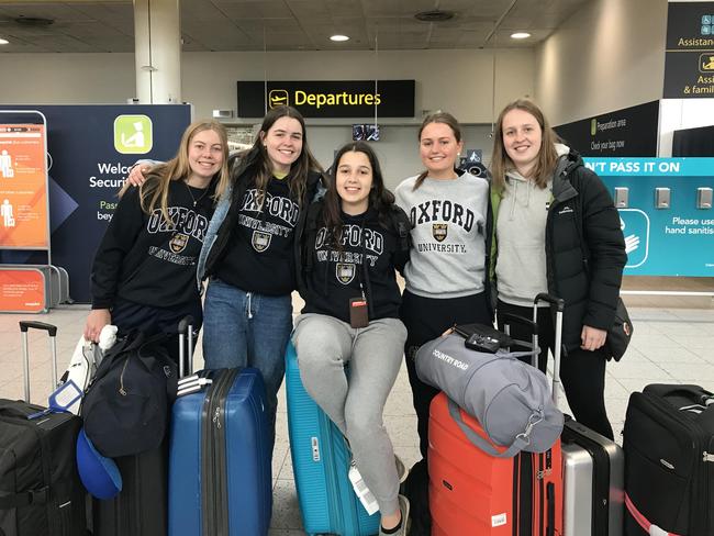 (L-R) Olivia Edwards, 19, Eliza Ewington, 18, Sascha Wilson, 18, Daisy Meehan, 18, and Cate von Behr, 18, leave London’s Gatwick Airport with their gap year in Oxford, UK, at a private school cut short. Picture: Stephen Drill