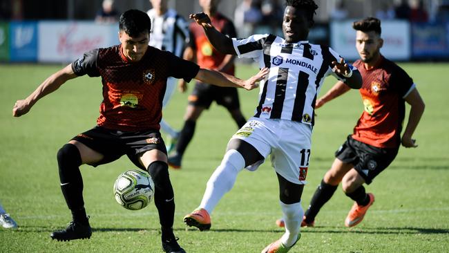 Hussain Askari, pictured playing in the FFA Cup SA last season, helped Ghan Kilburn City to a first-round triumph over Mount Barker United. Picture: AAP Image/Morgan Sette