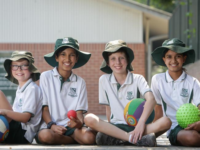 Gordon East Public School in Sydney is bringing active play back. From left, students Isabel Bown, 10, Rohan Parikh, 12, Fred Bown, 12, and Asha Parikh, 10. Picture: Liam Driver