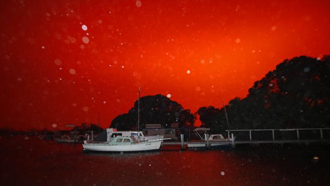 Fire closes in on the Mallacoota township. Picture: David Caird