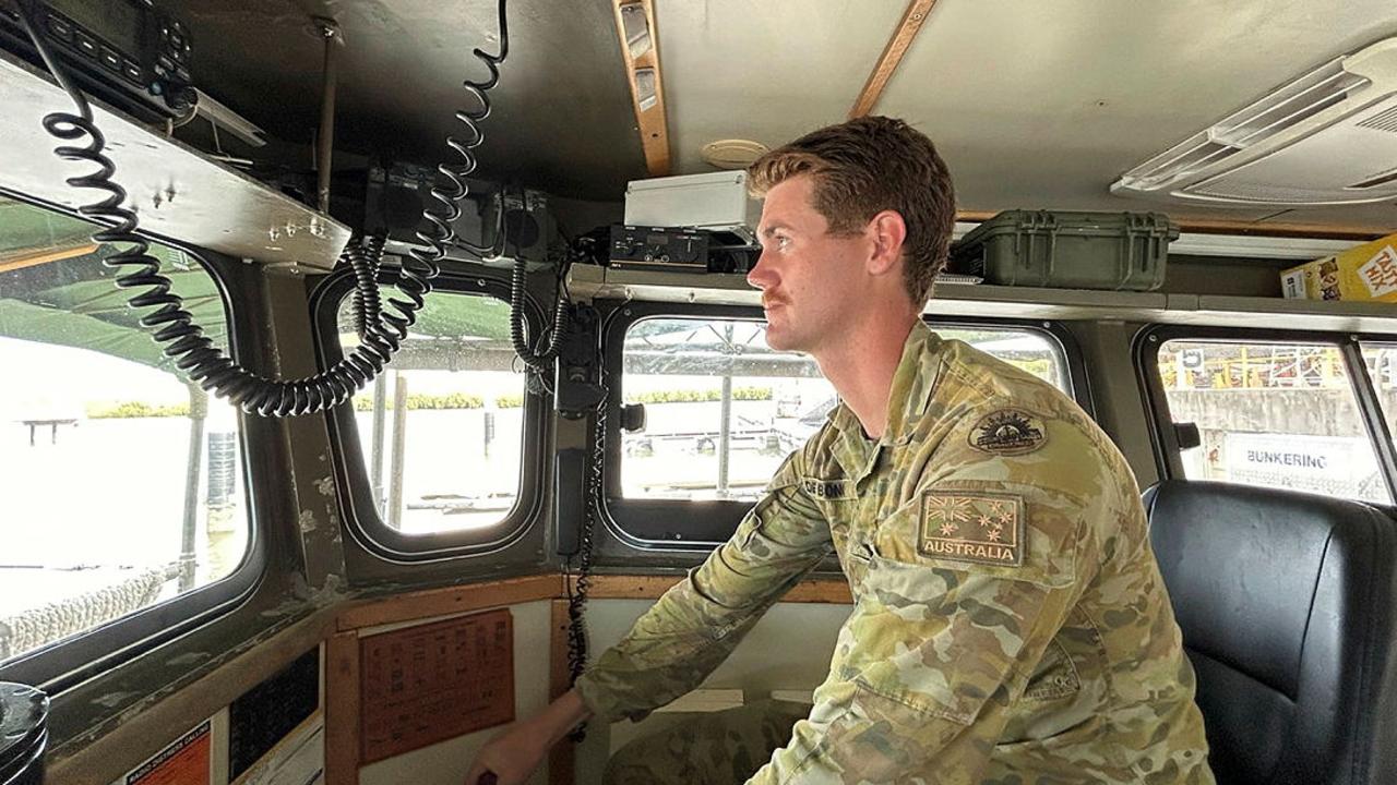 Vessel Master CPL Ridge Debono prepares to depart Townsville aboard Landing Craft "Snoopy" for flood assist tasking in Far North Queensland. Photo: Defence Media