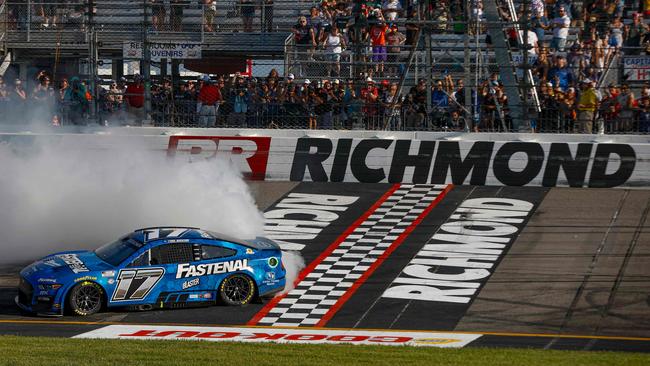 Chris Buescher, driver of the #17 Fastenal Ford, celebrates with a burnout after winning the NASCAR Cup Series Cook Out 400 at Richmond Raceway. Photo: Sean Gardner / GETTY IMAGES