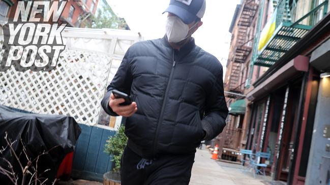 David Schwimmer wears a cap and mask as he leaves his home in the East Village neighbourhood in Manhattan, New York. Picture: G.N.Miller/NY Post