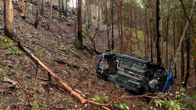 A car which plunged down the side of a cliff on Beechmont road, Advance Town in 2016. Picture: Scott Fletcher