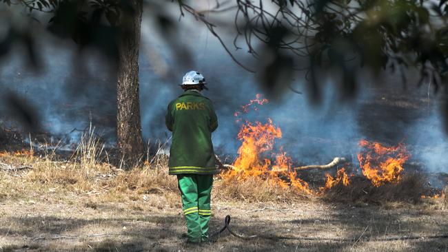 A firefighters at the scene of the blaze. Picture: Nigel Hallett.