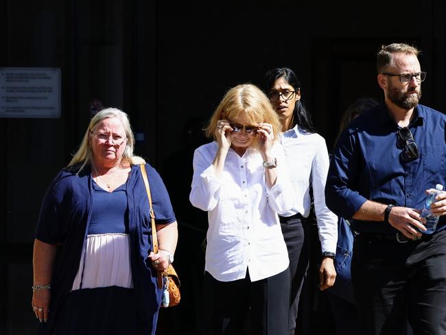 Family members of pilot Stuart Weavell leave the Cairns Coroner's Court during the inquest into a plane crash on Cape York, which killed Mr Weavell and four QBuild contractors on March 11, 2020. The light plane crashed into sand dunes in bad weather during the approach to Lockhart River airport, killing all five men onboard. Picture: Brendan Radke