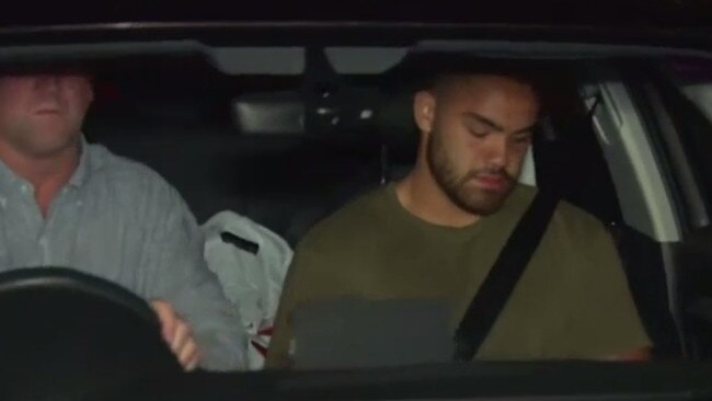 Dylan Walker and Des Hasler leave Manly Police Station. Picture: 9 News