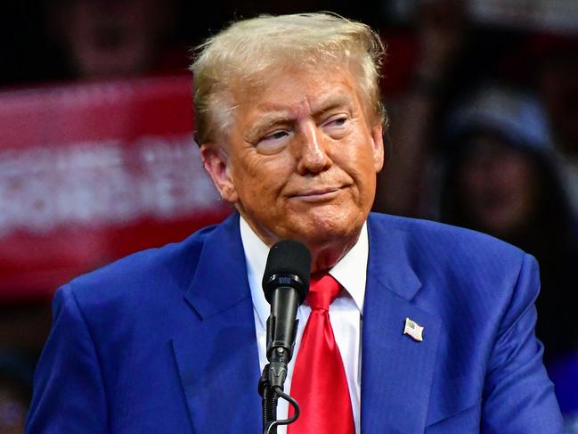 TOPSHOT - Former US President and Republican presidential candidate Donald Trump looks on during a campaign rally at Findlay Toyota Arena in Prescott Valley, Arizona, on October 13, 2024. (Photo by Caitlin O'Hara / AFP)