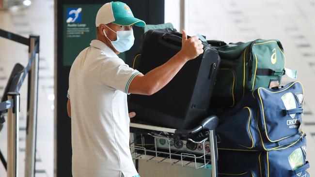 David Warner gives the thumbs up as the Australian T20 cricket team arrive at Brisbane International Airport after their World Cup win in Dubai. David Warner. Picture: Zak Simmonds