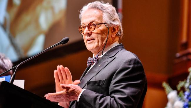 Australian filmmaker and Mad Max director George Miller speaks at the memorial service. Picture: AAP / Kelly Barnes