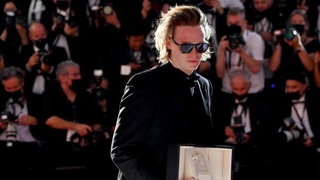 Caleb Landry Jones with his trophy for Best Actor Prize for his part in Nitram at the 74th edition of the Cannes Film Festival in Cannes. Picture: AFP