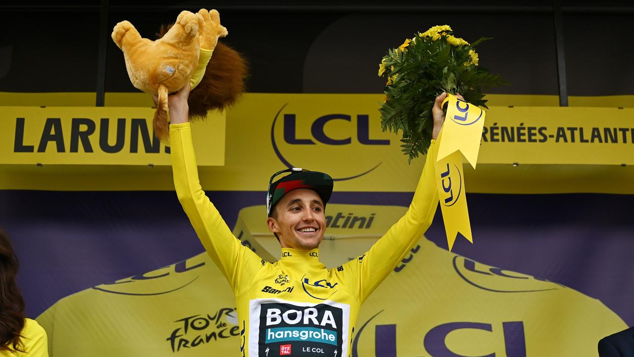 LARUNS, FRANCE – JULY 05: Jai Hindley of Australia and Team BORA-Hansgrohe celebrates at podium as Yellow leader jersey winner during the stage five of the 110th Tour de France 2023 a 162.7km stage from Pau to Laruns / #UCIWT / on July 05, 2023 in Laruns, France. (Photo by David Ramos/Getty Images)