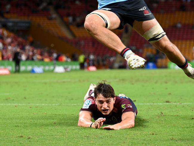 Jock Campbell scores a try for the Reds against the Waratahs. Picture: Dan Peled/Getty Images