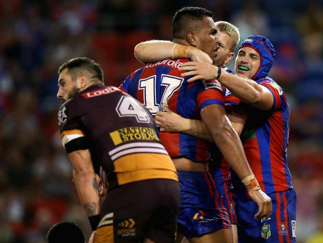 NEWCASTLE, AUSTRALIA - APRIL 07:  Daniel Saifiti of the Knights celebrates his try with team mates  during the round five NRL match between the Newcastle Knights and the Brisbane Broncos at McDonald Jones Stadium on April 7, 2018 in Newcastle, Australia.  (Photo by Ashley Feder/Getty Images)