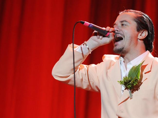 US singer Mike Patton, of metal band 'Faith no More' performs on stage during the 13th Hurricane Festival in Scheessel, northern Germany, on June 20, 2009 in Scheessel. Sixty bands are scheduled to play during the festival, which lasts from June 19 to June 21. AFP PHOTO DDP/ NIGEL TREBLIN GERMANY OUT