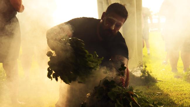 Smoking ceremony at Darwin Waterfront on Survival Day. Picture: (A)manda Parkinson